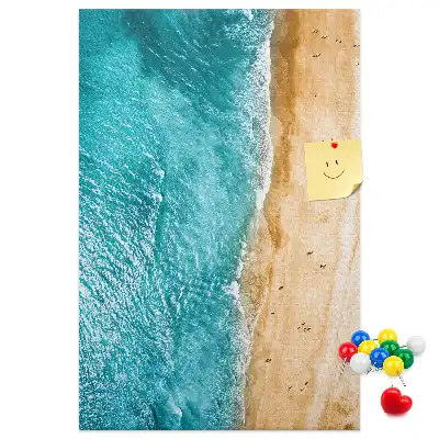 Prikbord met afbeelding van een strand