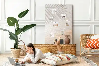 Prikbord van kurk Schaduw van een palmblad
