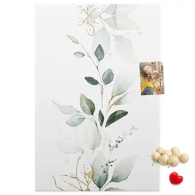 Prikbord van kurk Een plantenscheut met bladeren