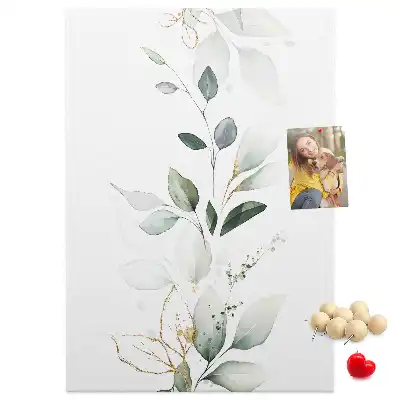 Prikbord van kurk Een plantenscheut met bladeren