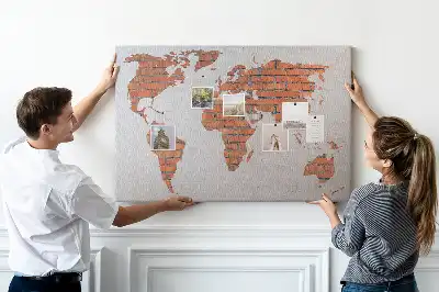 Memobord van kurk Continenten op bakstenen achtergrond