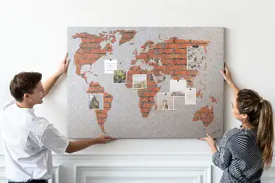 Memobord van kurk Continenten op bakstenen achtergrond