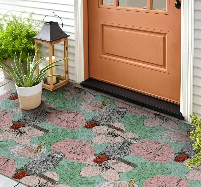 Buiten deurmat Papegaaien in de tropen