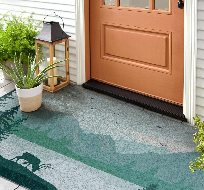 Schoonloopmat Hert met bergen op de achtergrond