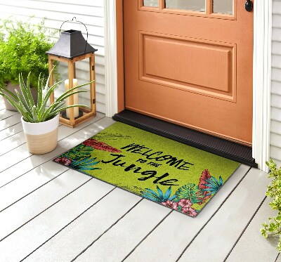 Deurmat voor buiten Welkom in de jungle-inscriptie