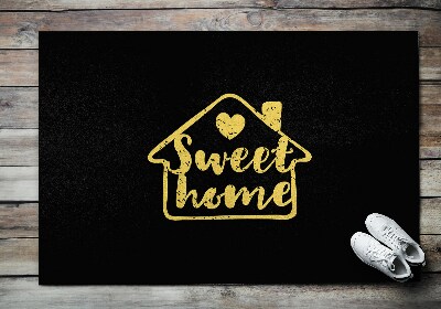 Buiten deurmat Met het opschrift Home Sweet Home
